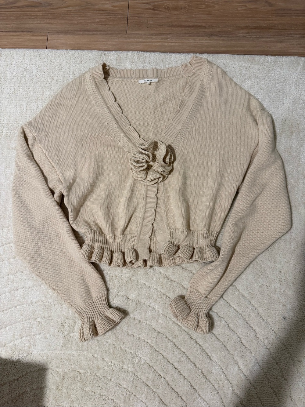 Tularosa Beige Ruffled Knit Cardigan with Floral Accent